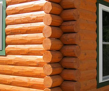 Hand hewn log siding and Timberline log corners. The real look of a log home.