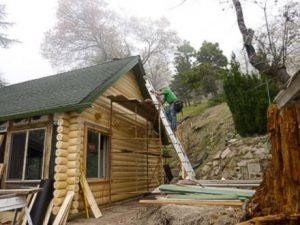 Remodel with log siding and Timberline log corners on house in California