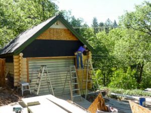 Remodel with log siding and Timberline log corners on house in California