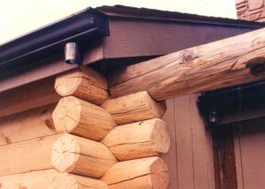 Log beam cut in to Timberline log corners