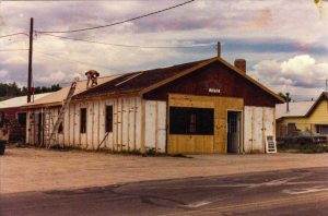 Remodel with log siding and Timberline log corners on commercial building in Hygiene, CO