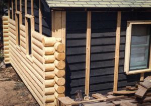 Remodel with log siding and Timberline log corners In Hygiene CO