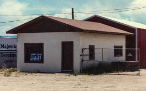 Remodel with log siding and Timberline log corners on commercial building in Hygiene, CO