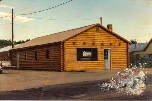 Remodel with log siding and Timberline log corners on commercial building in Hygiene, CO