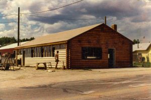 Remodel with log siding and Timberline log corners on commercial building in Hygiene, CO