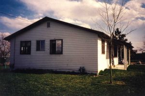 Remodel with log siding and Timberline log corners on house with lap siding.