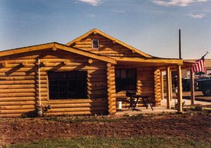 Remodel with log siding and Timberline log corners at a sawmill in Laporte,CO