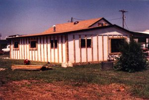 Remodel with log siding and Timberline log corners at a sawmill in Laporte,CO