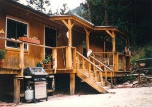 Remodel with log siding and Timberline log corners in the mountains above Glenhaven CO