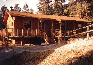 Remodel with log siding and Timberline log corners in the mountains above Glenhaven CO