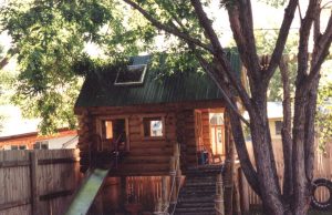 Log sided play house.