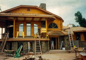 Log siding with stonework