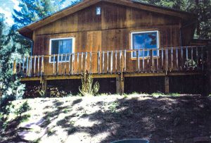 Remodel with log siding and Timberline log corners in the mountains