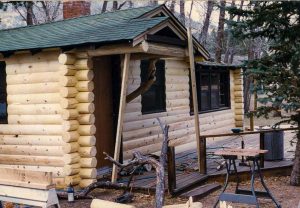 Small porch on a log sided cabin